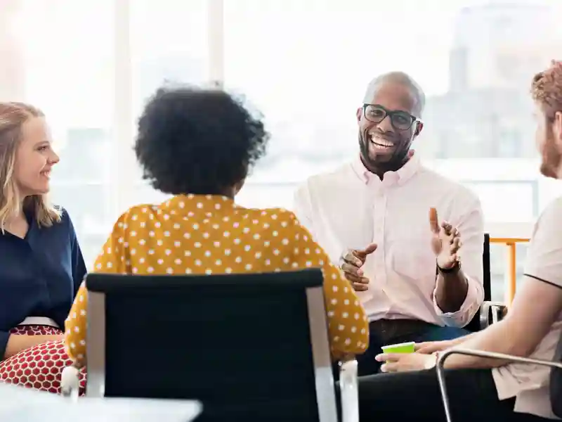 Business people having meeting in modern office.