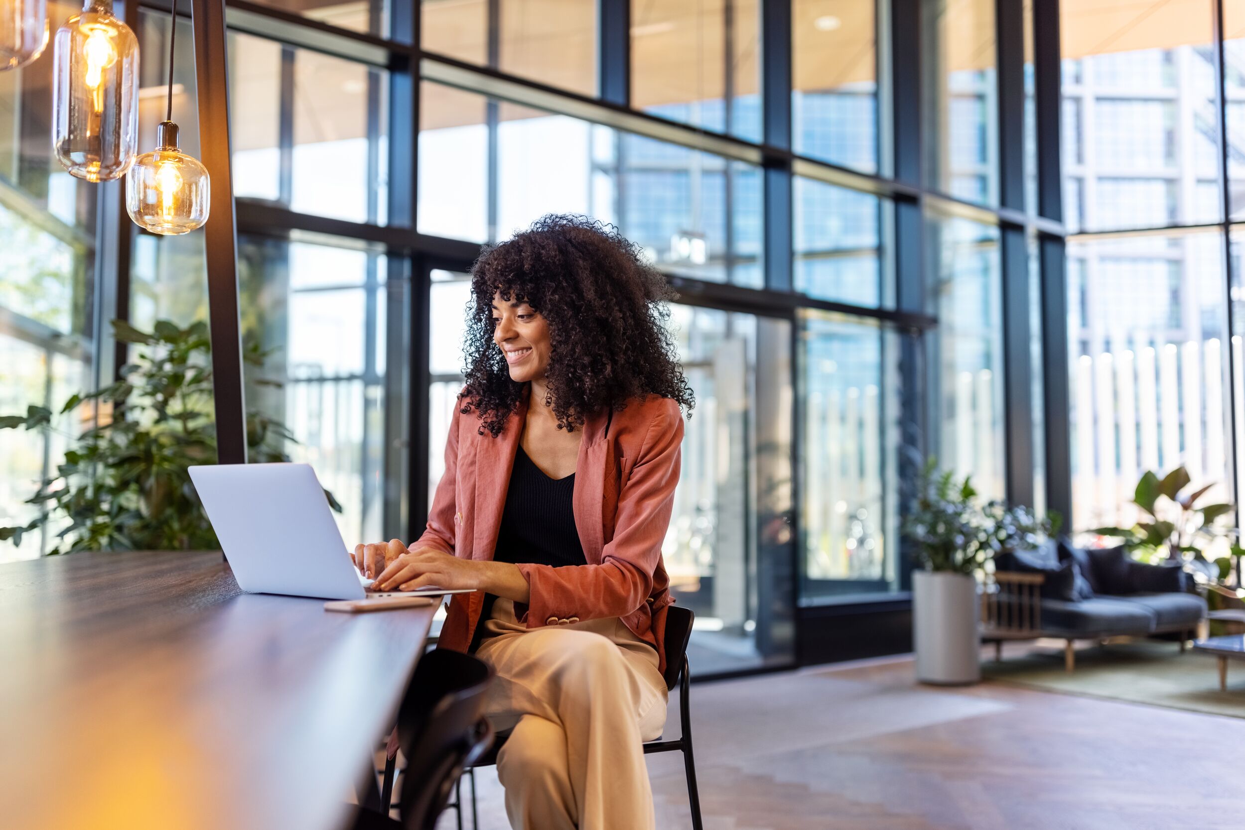 Woman using her laptop on a table.