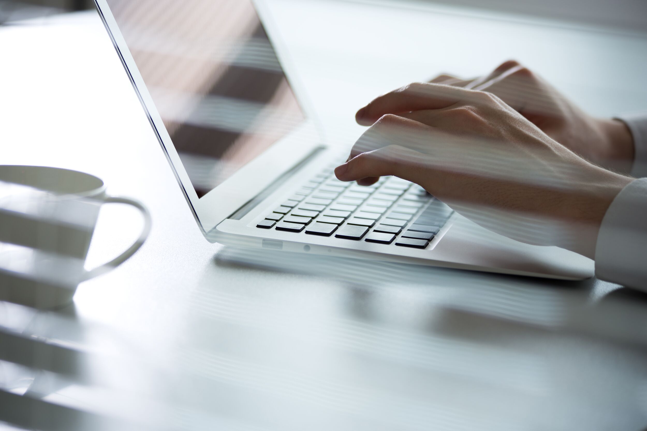 Woman using her laptop.