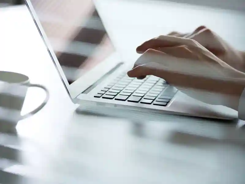 Woman using her laptop.