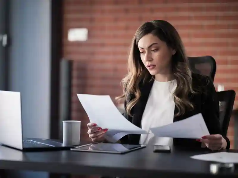 Business woman working at her desk.